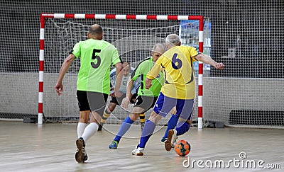 Odessa, Ukraine- May 29, 2020: Cup playoff match match in futsal among veterans 50+. Futsal on large stage of sports hall, Editorial Stock Photo
