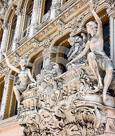 Odessa, Ukraine: sculptures of modernist style on the balcony of Odessa passage - old covered mall and architectural monument Editorial Stock Photo