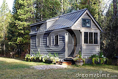Off grid tiny house in the mountains Stock Photo