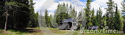 Off grid tiny house in the mountains Stock Photo