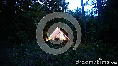 Off Grid Tipi / Wall Tent Camp. Airbnb Hipcamp Bushcraft campsite. Survival Shelter Stock Photo