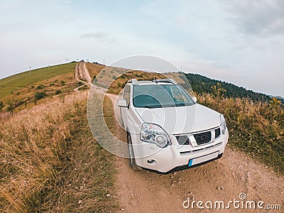 off road car travel by mountains peak autumn season Stock Photo