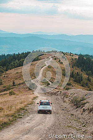off road car travel by mountains peak autumn season Stock Photo