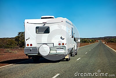 An off-road SUV car towing a caravan in Western Australia Stock Photo