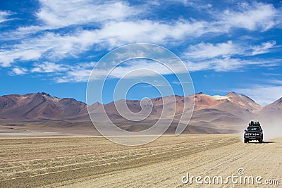 Off-road vehicle driving in the Atacama desert, Bolivia Editorial Stock Photo