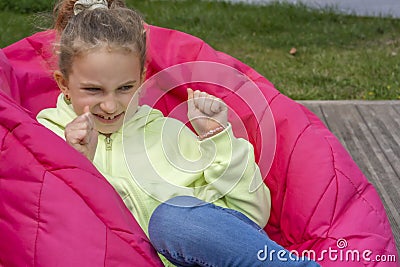 Offended kid portrait. Child punishment. Disobedience problem. Unhappy displeased skeptic stubborn grumpy cute little Stock Photo