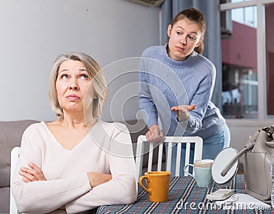 Offended mature mother Stock Photo