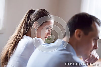 Offended millennial couple avoid talking after fight Stock Photo