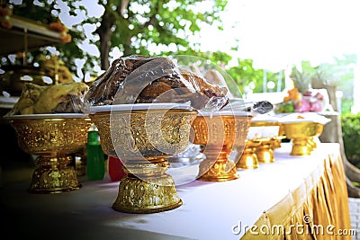 offering tray In front of Phra Phum Chao Shrine Stock Photo