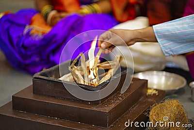 Worshiping Fire. Homa. Hindu marriage ritual Stock Photo