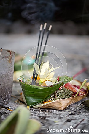Offerings to gods: food and aroma sticks Stock Photo