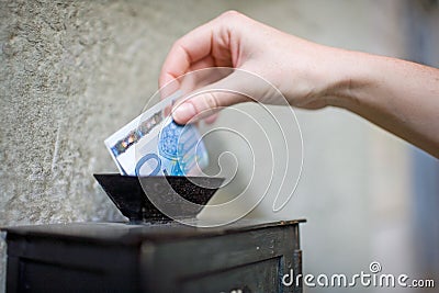 Offertory box in church Stock Photo