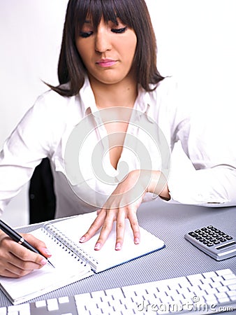 Office Assistance writing Shedule Stock Photo