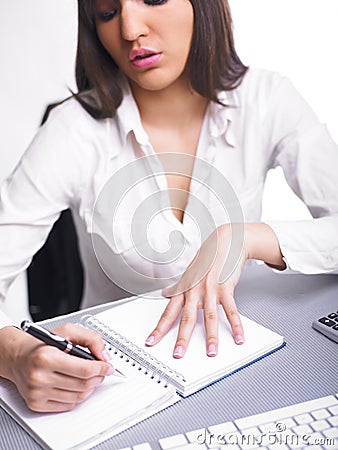 Office Assistance writing Shedule Stock Photo