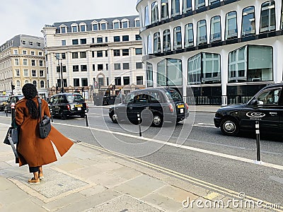 Black cabs or taxi in traffic in London Cannon street , England Editorial Stock Photo