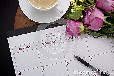 Office calendar planner on the coffee table Stock Photo
