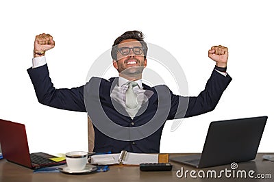 Office corporate portrait of young handsome and attractive happy businessman smiling cheerful and satisfied enjoying business succ Stock Photo