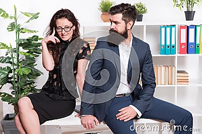 Office couple. Office flirt. Career company. Flirting and seduction. Sexy secretary and manager. Office job affair Stock Photo