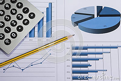 Office desk with charts , histograms and financial documents Stock Photo