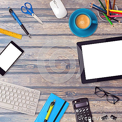 Office desk mock up template with tablet, smartphone and office items on wooden table Stock Photo