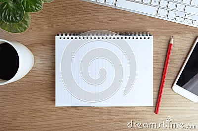 Office desk table with computer, smartphone, supplies, flower and coffee cup Editorial Stock Photo