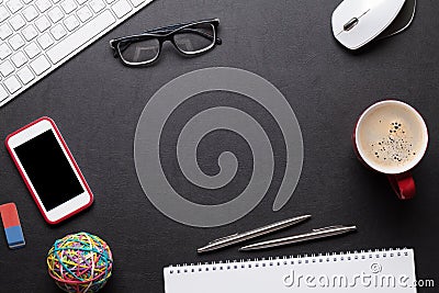 Office desk table with pc, notepad, glasses, coffee and phone Stock Photo