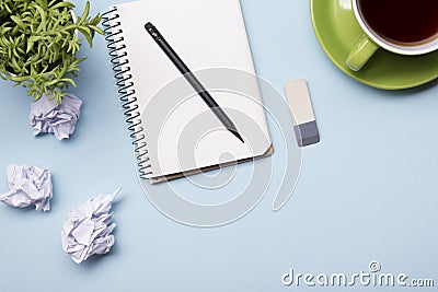 Office desk table with supplies top view. Notepad, pen and colorful paper. Copy space for text Stock Photo