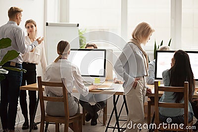 Office employees working together, businesspeople group teamwork Stock Photo