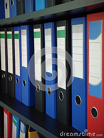 Office folders organizers on a cabinet. Stock Photo