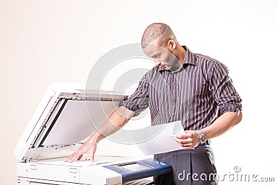 Office man making copies of documents Stock Photo