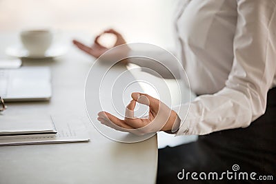 Office meditation for reducing work stress concept, female hands Stock Photo