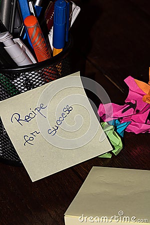 Office objects and sticky note or post it with text Recipe for success Stock Photo