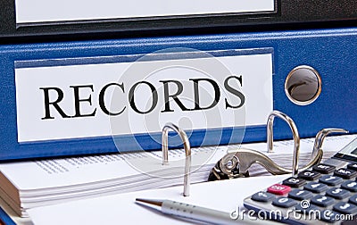 Office records and calculator Stock Photo