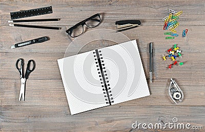 Office and school supplies. Open book and writting tools Stock Photo
