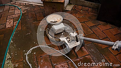 The office is scrubbing the floor Stock Photo