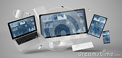 office stuff and devices floating with stats and financial data Stock Photo