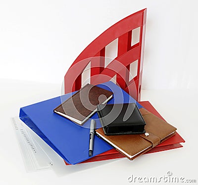 blue, brown, red, black, colored stationery scattered on the table Stock Photo