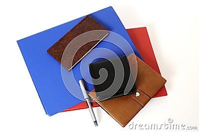 Blue, brown, red, black, colored stationery scattered on the table Stock Photo