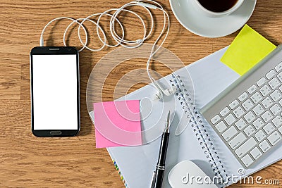 Office table with notepad, computer, coffee cup, computer mouse Editorial Stock Photo