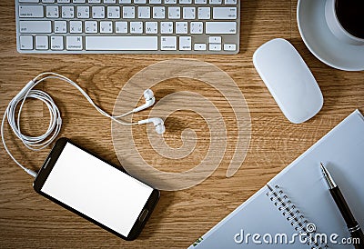 Office table with notepad, computer, coffee cup, computer mouse Editorial Stock Photo