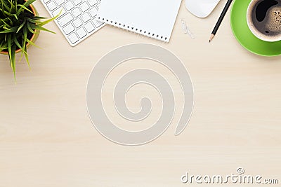 Office table with notepad, computer and coffee cup Stock Photo