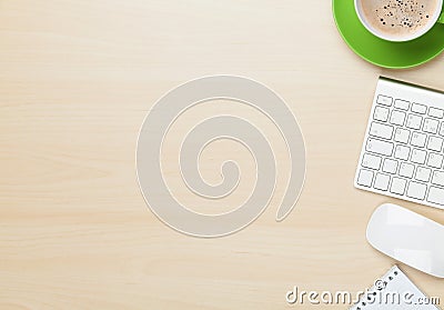 Office table with notepad, computer and coffee cup Stock Photo