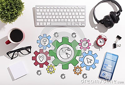 Office table with stationary and conceptual scheme of business online Stock Photo