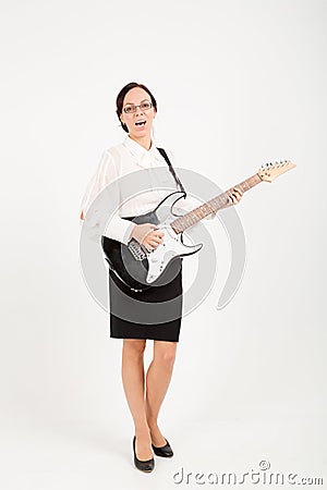 Office woman playing on guitar Stock Photo