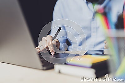 Office worker sitting at laptop and working on projects. Homebased jobs. Person getting distant online education via internet Stock Photo