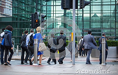 Office workers going to work. London, Canary Wharf Editorial Stock Photo