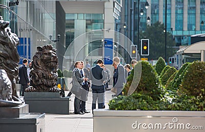 Office workers going to work. London, Canary Wharf Editorial Stock Photo