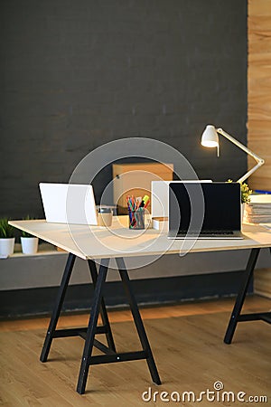 Office workplace with laptop and on wood table Stock Photo