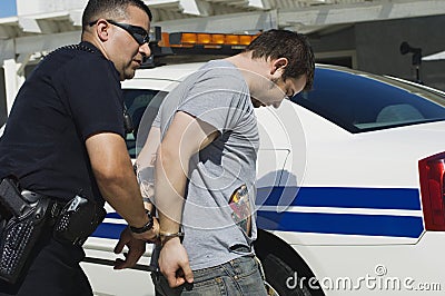 Officer Arresting Drug Dealer Stock Photo