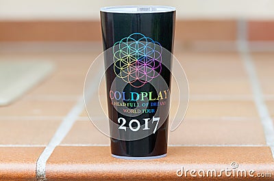 Official Coldplay world tour travel mug Editorial Stock Photo